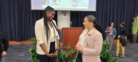DeLisha Milton-Jones (left) and Maia Chaka (right) get a chance to meet and take photos after the keynote event on March 1, 2022. Chaka cites Milton-Jones as being one of the people she looked up to in her career. 
