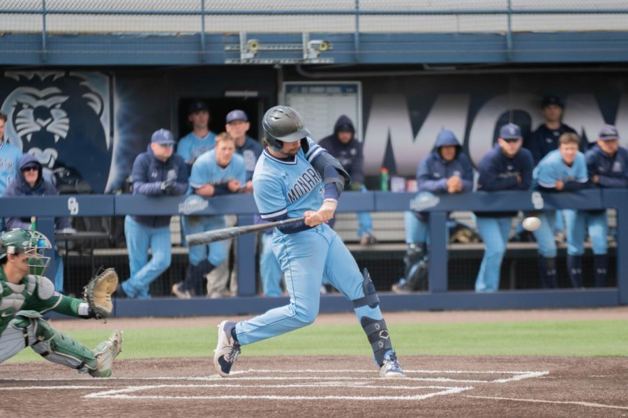 Old Dominion takes helm at the plate and let the bats fly as the ball is incoming.