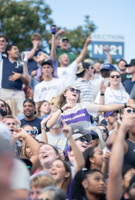 Both JMU and ODU fans alike enjoy the game environment as they sing along to a top hit. 
