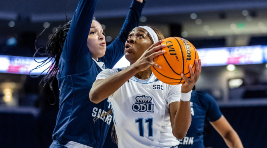 Senior guard Kaye Clark looks up to try and go for the layup in the matchup against the Eagles. 