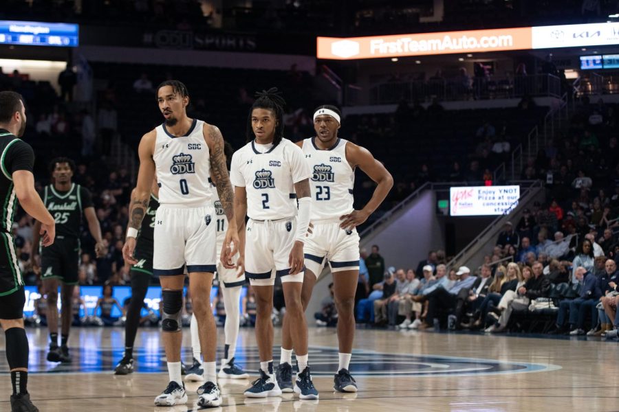 ODU players Mekhi Long #0, Chaunce Jenkins #2, and Derricko Williams #23 look on as they wait for the Marshall inbound.