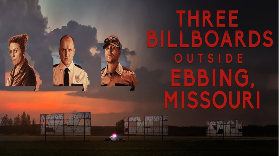 An Ebbing police car rides by three old, tattered billboards outside Ebbing, Missouri. (Left to right) Frances McDormand, Woody Harrelson, and Sam Rockwell. Photo via Slusatel at themoviedb.org.