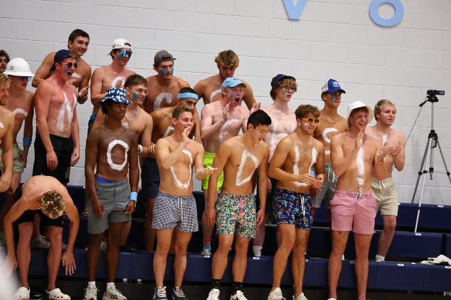 Members of the ODU Swimming team made their way out to cheer on the Volleyball team in their matchup against VCU. 