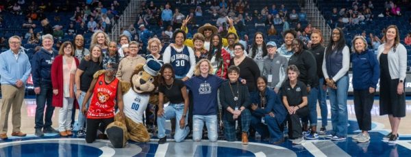 ODU womens basketball Alumni take the court to gather for a group photo. 