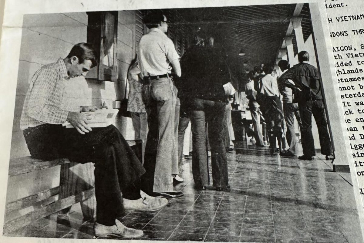 Archival photo of Guantanamo Bay personnel waiting to register for ODU classes