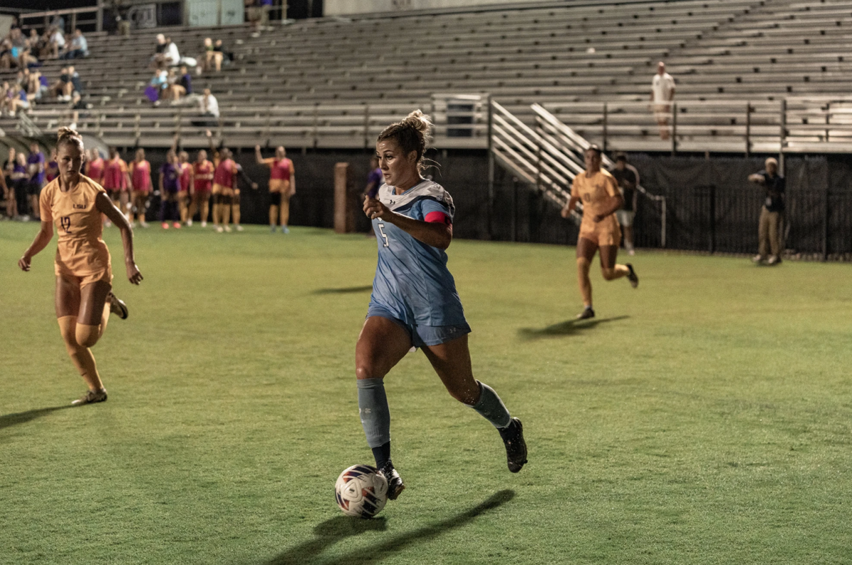 Senior forward Rhea Kijowski dribbles the ball into the LSU box for a potential attacking chance. 