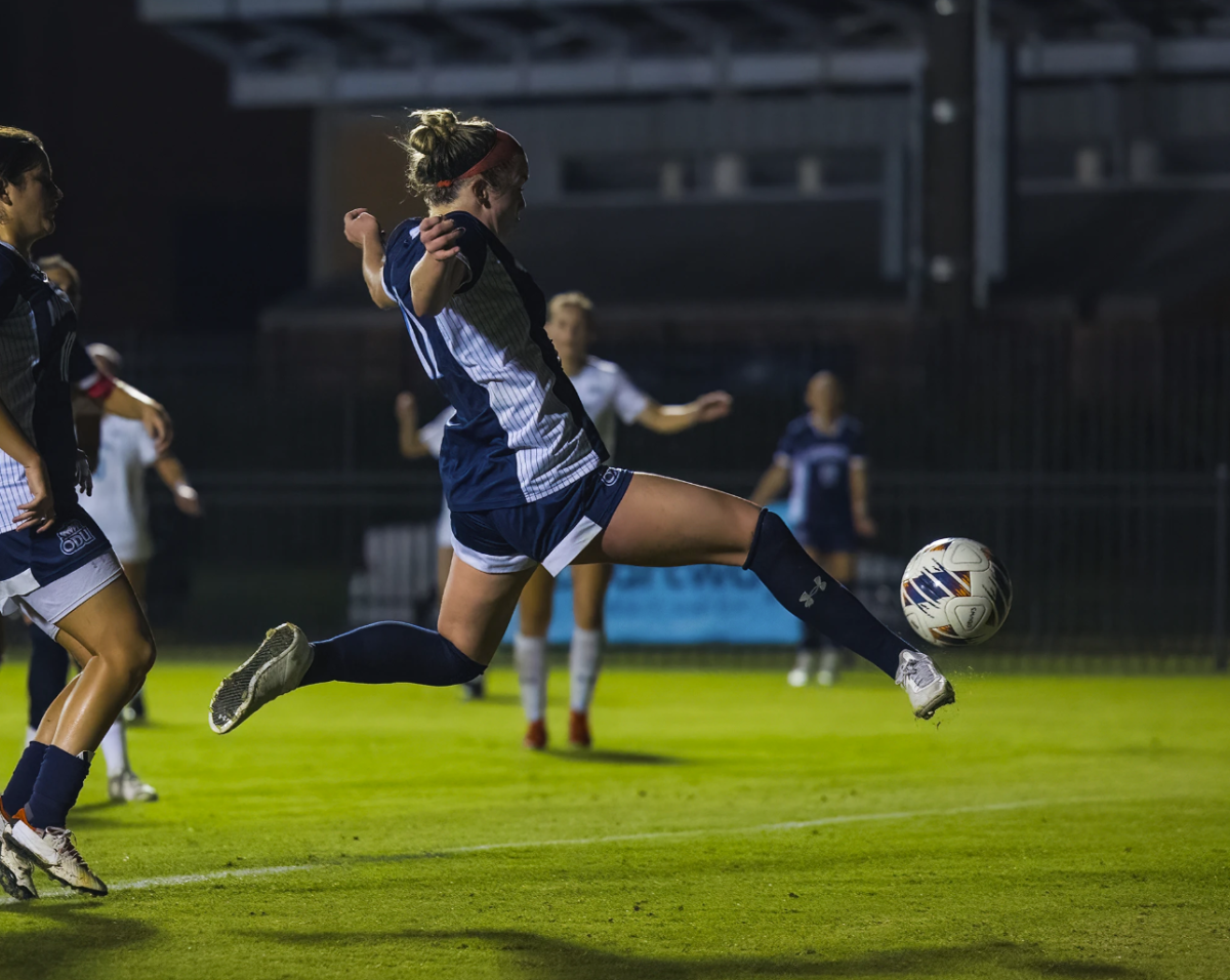 Freshman forward Brooke Edwards puts away the ball to tie the match at 1 against Coastal. 