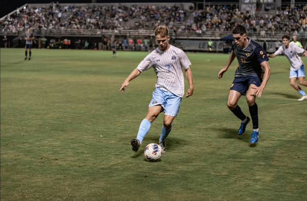 Sophomore forward William Arnesen plays the ball in front of a packed ODU Soccer Complex. 