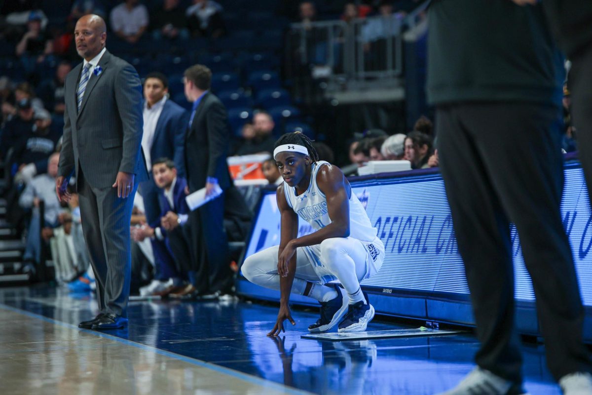 Robert Davis Jr. looks on from the sidelines in matchup against Arkansas State. 