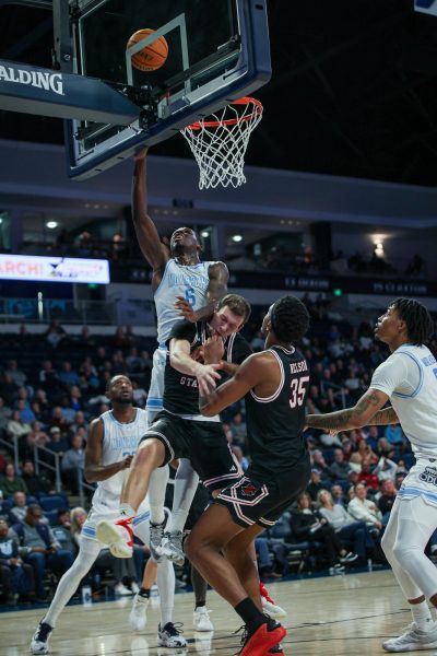 Sean Durogordon goes up for the layup in matchup against Red Wolves. 