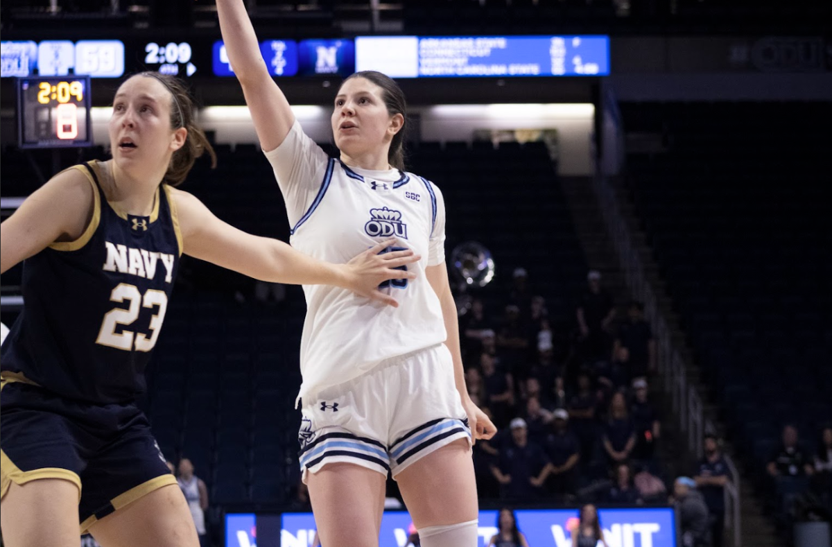 Senior forward Brenda Fontana follows through with her shot in matchup against Midshipmen. 