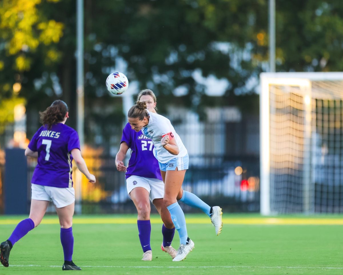 Captain Ashlynn Kulha fighting for possession